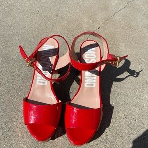 MOSCHINO red heels
Size 7.5